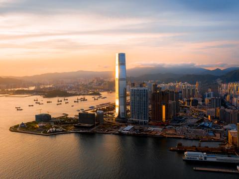 Cityscape of the harbour region of Hong Kong Island during sunset. © 2021 Manson Yim / Unsplash