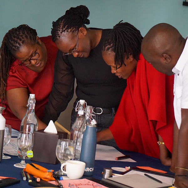 AMREF staff at CoP event