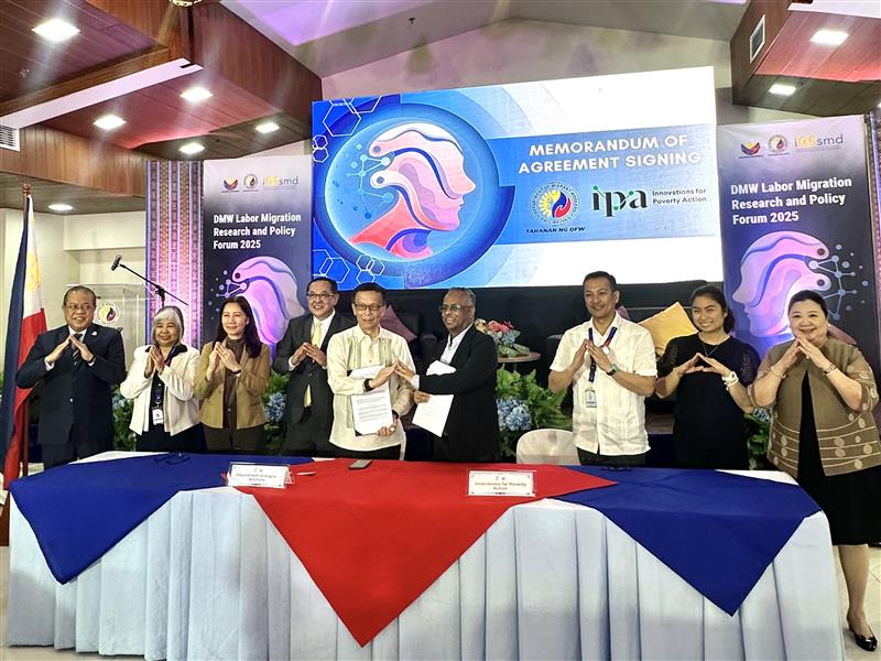 Group photo of attendees at MOU signing event