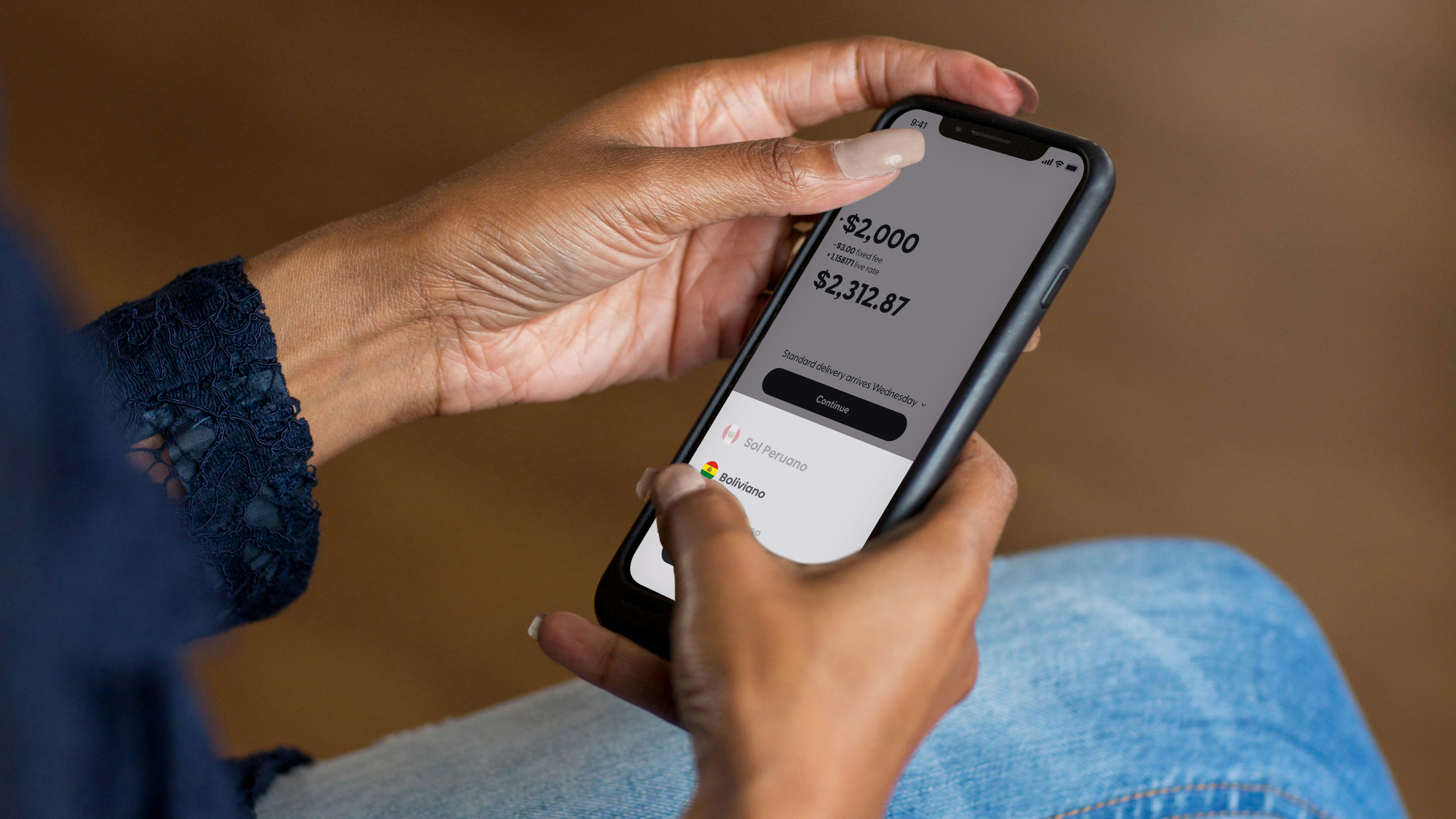 A person making digital transactions on a mobile phone