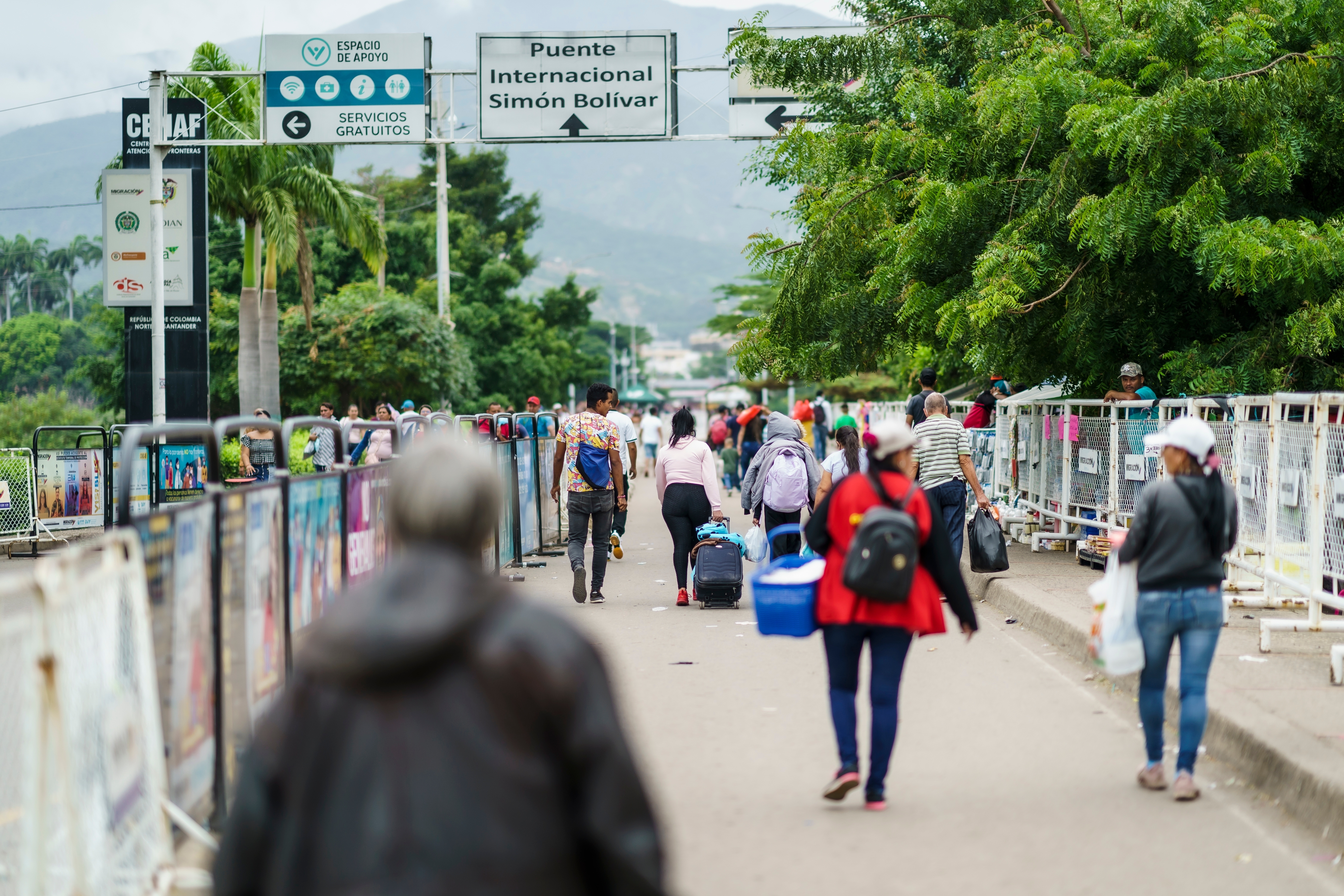 Venezuelan migrants crossing the Colombian border at La Parada. ©2022, bgrocker from Shutterstock
