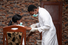A patient receives a dose of the COVID-19 vaccine in Nigeria