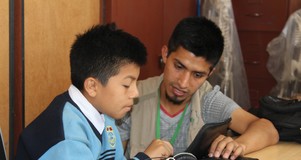 A student uses the tablet program.
