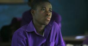 A Ghanaian student sits in class