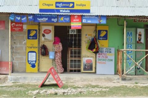 Agent for Tigo Pesa, Ezy Pesa, Airtel Money, M-PESA, Safaricom in rural Zanzibar, Tanzania. 