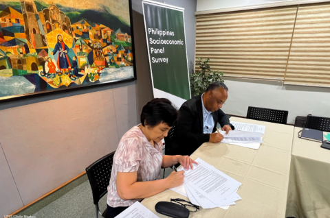 UPSE Dean Joy Abernica and Philippines Country Director Aftab Opel sign an MoU for PSPS