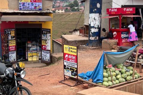 Photo of roadside mobile money vendors in Uganda