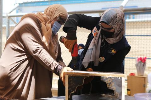 Women during recreational activities in a safe space for women and girls in Jordan’s Zaatari refugee camp