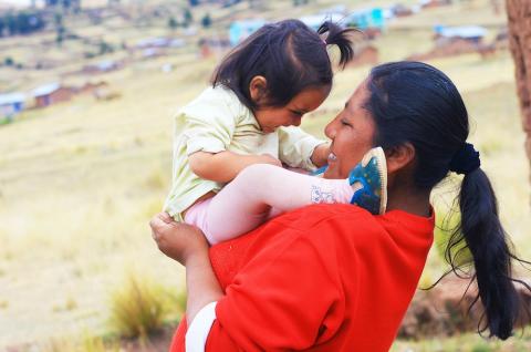 A mother and child playing in rural Peru. © 2023 Ruslana Lurchenko / Shutterstock.com