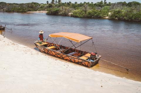 A boat on a lagoon in the state of Maranhão, Brazil © 2022 Dione Film on Unsplash.