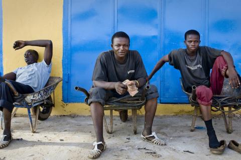 Three young men resting in Monrovia, Liberia. © 2010 Glenna Gordon