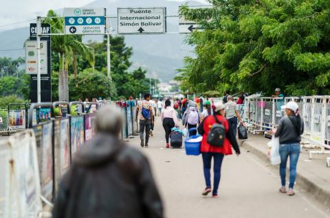 Venezuelan migrants crossing the Colombian border at La Parada. ©2022, bgrocker from Shutterstock