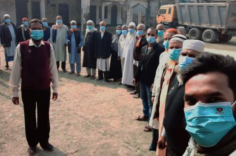 Photo of a group of people wearing face masks in Bangladesh