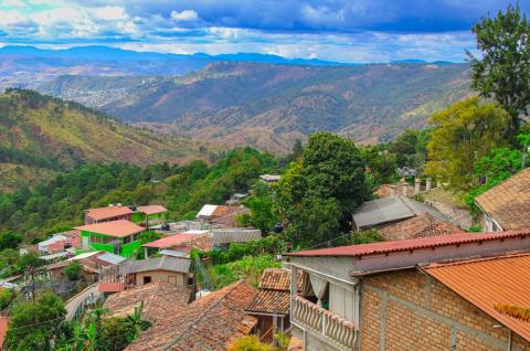 View of a mountainside village in Honduras. © 2023 Omri Eliyahu on Shutterstock