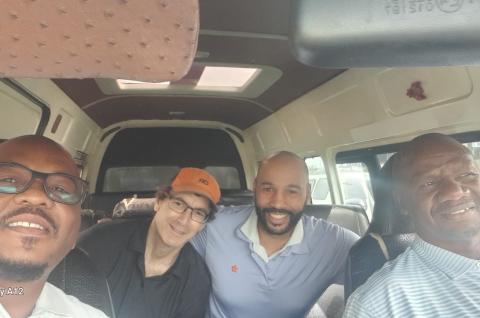 A minibus driver with employee of financier and the PIs