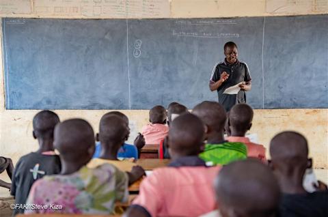 Grade 3 learners of Kalemchuch Primary School in Kakuma actively participate in a classroom lesson. © Steve Kiza / Film Aid Kenya 