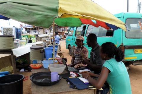 IPA surveyors interview loan borrowers in Ghana