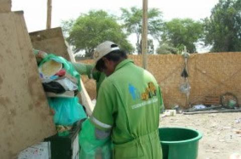 Photo of a recycling worker