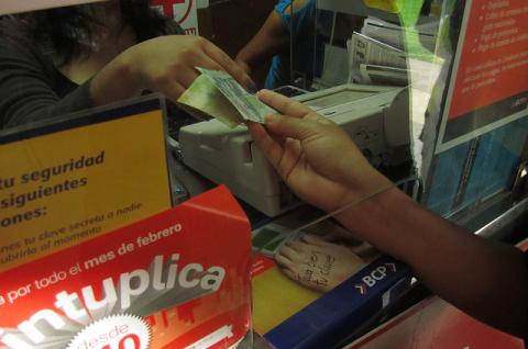Photo of person accepting money
