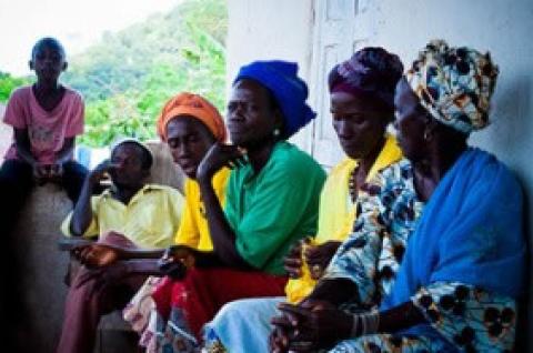 A rural community gathers in Sierra Leone