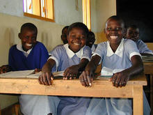 School girls sit in a classroom in Kenya